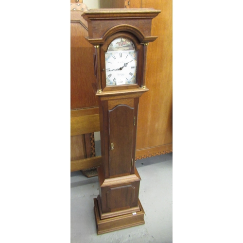 1157 - Modern mahogany Grandmother clock with miniature movement having weights and pendulum, 120cm high