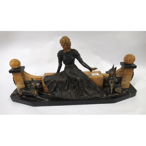 1178 - Art Deco painted and patinated spelter group of a seated girl with two dogs before a decorative wall... 