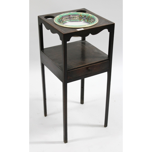 1200 - 19th Century square mahogany two tier wash stand, inset with a pottery wash basin