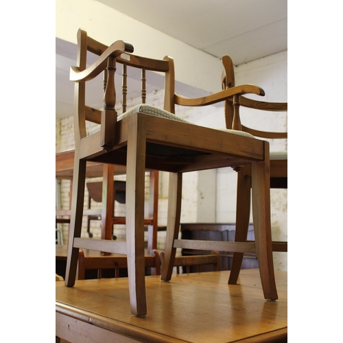 1205 - Modern pine rectangular extending dining table on turned supports, together with a set of eight (six... 