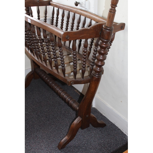 1213 - 19th Century Continental fruitwood cradle with bobbin turned uprights and stretcher