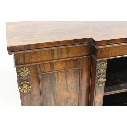 1285 - Regency rosewood breakfront dwarf bookcase, the figured top above a plain frieze and open adjustable... 