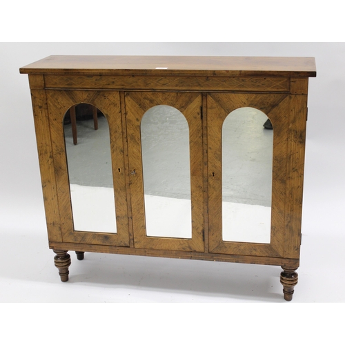 1367 - Regency style rosewood side cabinet having three arched panelled doors with mirrored inserts on turn... 