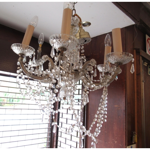 1397 - Pair of 20th Century brass six branch chandeliers with glass drops, 43cm high