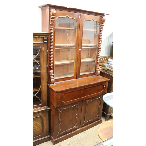 1434 - Reproduction mahogany secretaire bookcase, the moulded cornice above a pair of glazed doors flanked ... 