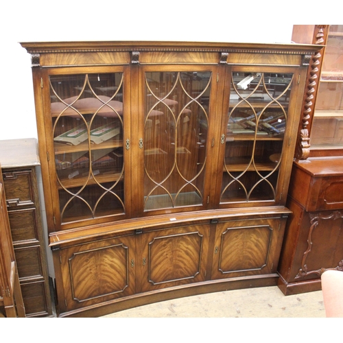 1512 - Good quality reproduction mahogany inverted bow front bookcase (probably Bevan & Funnell), the mould... 