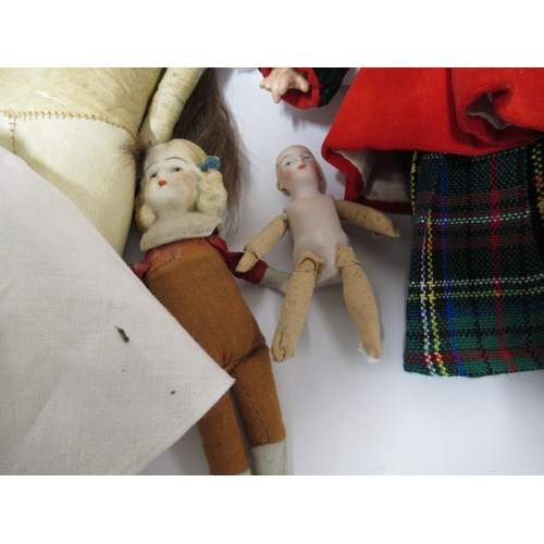 100 - Large box containing a quantity of various dolls, dolls clothes and other related collectables