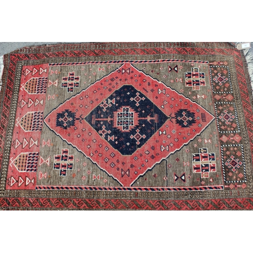 11 - Small Belouch rug with a single medallion in shades of blue, red and beige, 133 x 96cm