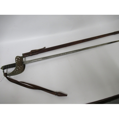 136 - George V officer's sword, the blade inscribed ' Church Lad's Brigade ', with a brown leather scabbar... 