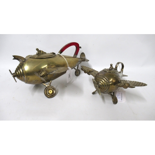 143 - Unusual mid 20th Century silver plated teapot in the form of a twin propellor aeroplane, 29cm long, ... 