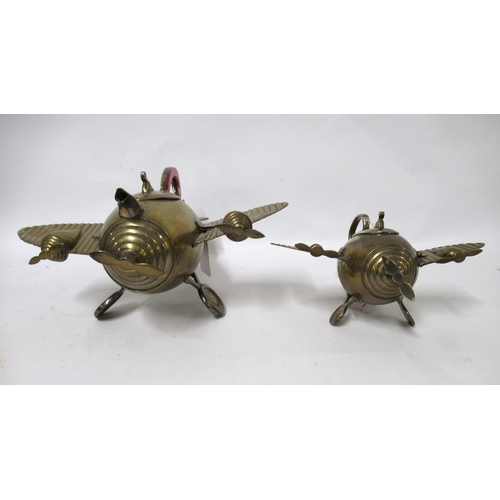 143 - Unusual mid 20th Century silver plated teapot in the form of a twin propellor aeroplane, 29cm long, ... 