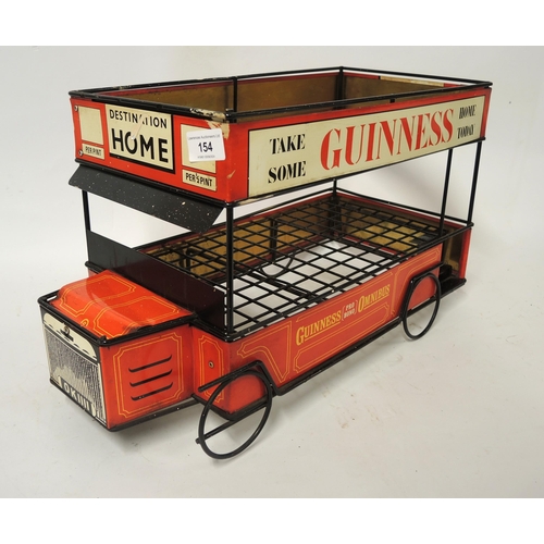 154 - 20th Century Guinness advertising drinks tray in the form of a bus, inscribed ' Guinness Pro Bono Om... 