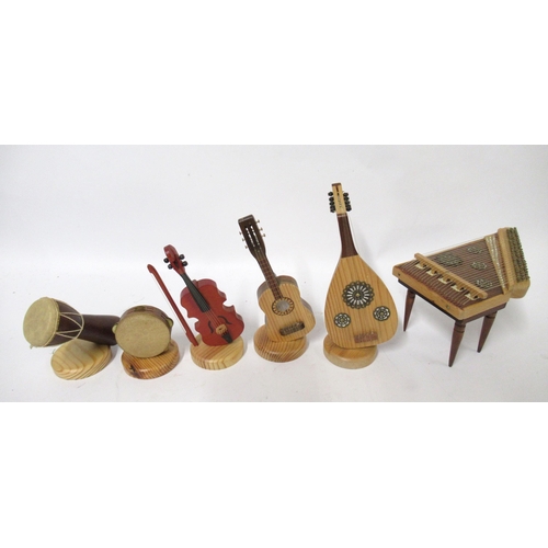 167 - Group of six modern miniature ornaments of musicals instruments