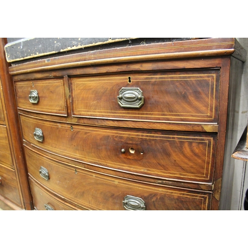 1679 - George III mahogany bow fronted and line inlaid chest of two short over three long graduated drawers... 