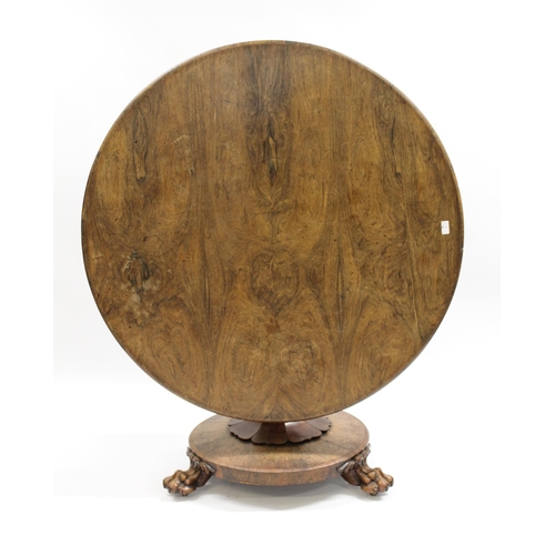 1684 - 19th Century rosewood circular loo table on an octagonal baluster column, with circular base and paw... 