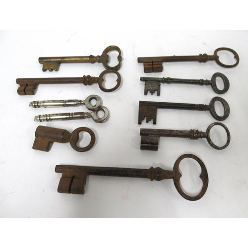 169 - Group of ten various antique iron and steel keys, inlcuding two early keys from Chubb, 128 Queen Vic... 