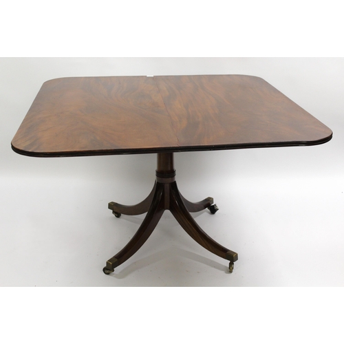 1702 - Regency rectangular mahogany pedestal breakfast table, the tilt top above a turned column support an... 