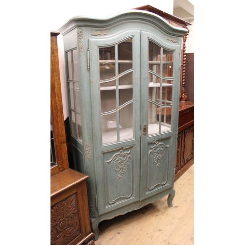 1707 - 19th Century French painted cabinet, the arched top above pair of glazed and panelled doors, raised ... 