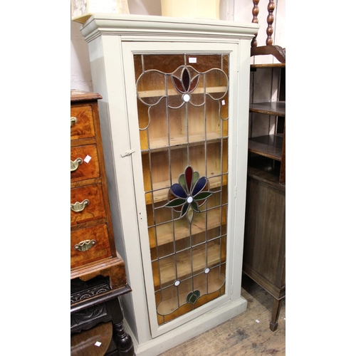 1710 - Pale green painted tall cabinet with a single leaded coloured glass door enclosing shelves, 80 x 28 ... 