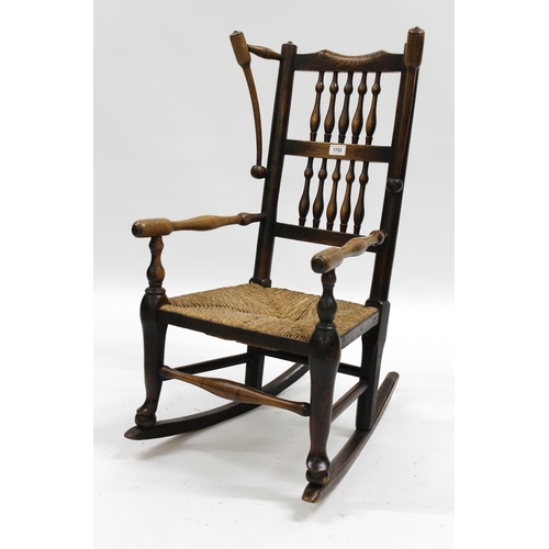 1733 - Child's antique elm and spindle back rocking chair with rush seat