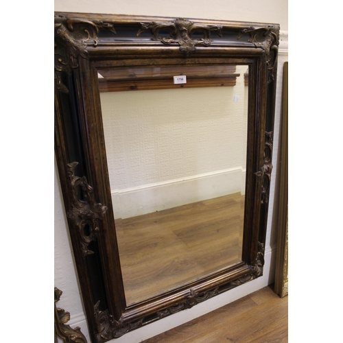 1750 - Reproduction composition gilt and ebonised rectangular wall mirror with bevelled plate, 102cm x 76cm