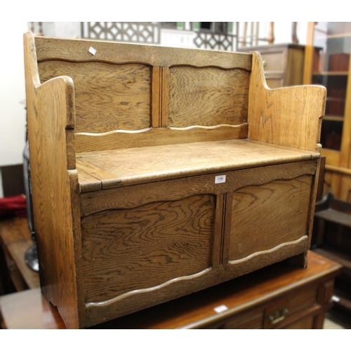 1755 - Mid 20th oak hall bench, the box seat having hinged cover, 91cm wide x 40cm deep x 82cm high