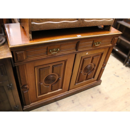 1757 - 19th Century aesthetic movement mahogany sideboard, having two short moulded drawers with brass swan... 