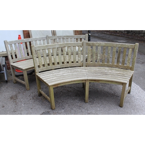 1765 - Large circular teak garden table, 182cm diameter and four curved benches by Nelson