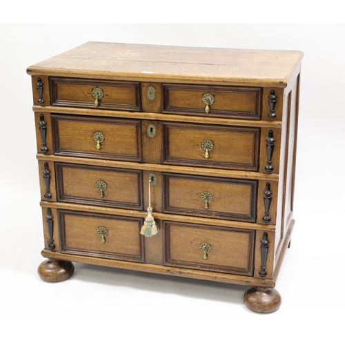 1794 - Small late 17th / early 18th Century oak moulded front chest, the plank top above four graduated dra... 