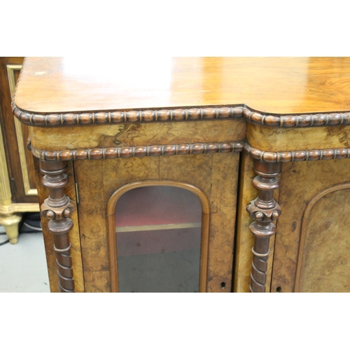 1795 - 19th Century walnut breakfront chiffonier, having central arched panel door flanked by two glazed ar... 