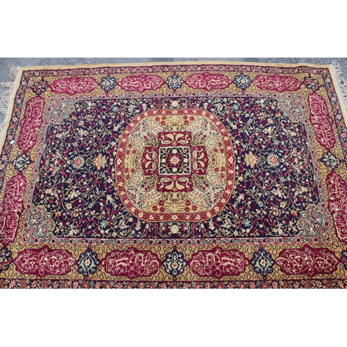 18 - Belouch rug with two centre panels, multiple borders on a burgundy ground, 125 x 128cm, together wit... 