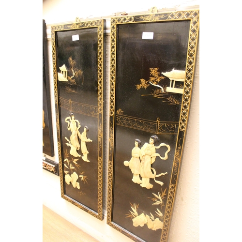 1822 - Set of four 20th Century Japanese lacquered panels inset with figures in garden scenes, 30 x 92cm