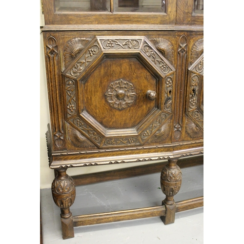 1824 - Good quality oak side cabinet circa 1930, with an arrangement of various carved, moulded and bevelle... 