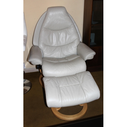 1830 - Modern Stressless cream leather upholstered swivel armchair, together with a matching footstool