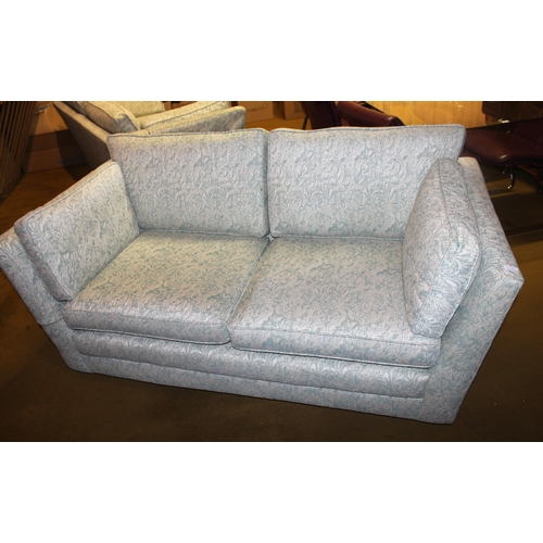 1833 - Pair of modern two seat sofas upholstered in a pale blue / silver grey floral fabric, together with ... 