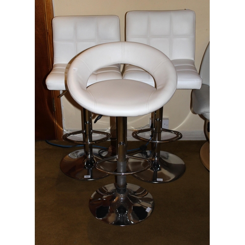 1834 - Pair of modern cream upholstered bar stools, together with another similar