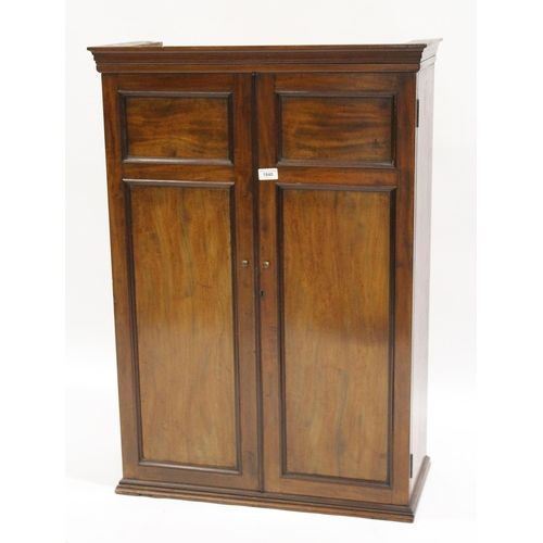 1840 - 19th Century mahogany cupboard with a moulded cornice above panelled doors enclosing shelves, 67cm w... 