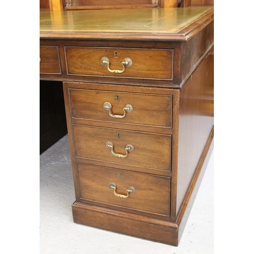 1846 - Edwardian mahogany twin pedestal desk, the leather inset top above nine drawers with brass ring hand... 