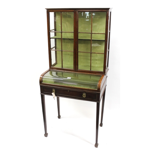 1858 - 19th Century mahogany display / bijouterie table with two glazed doors above a hinged glazed cabinet... 