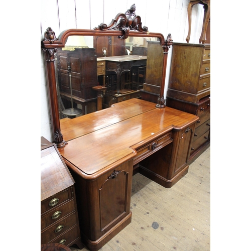 1861 - Good quality Victorian mahogany inverted breakfront sideboard, with a mirrored back above central dr... 