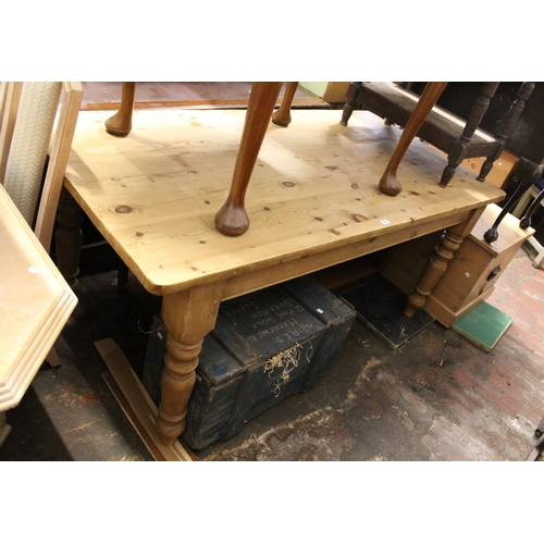 1863 - Stripped rectangular polished pine farmhouse kitchen table, on turned tapering supports, 182cm wide ... 