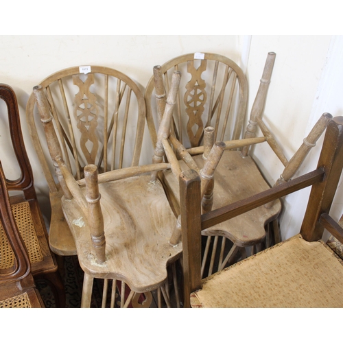 1873 - Set of four 20th Century elm seated wheel and stickback dining chairs, on turned supports