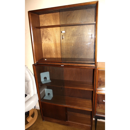 1880 - Herbet E. Gibbs, two 20th Century teak bookcases (one cut down), with sliding glazed and wooden door... 