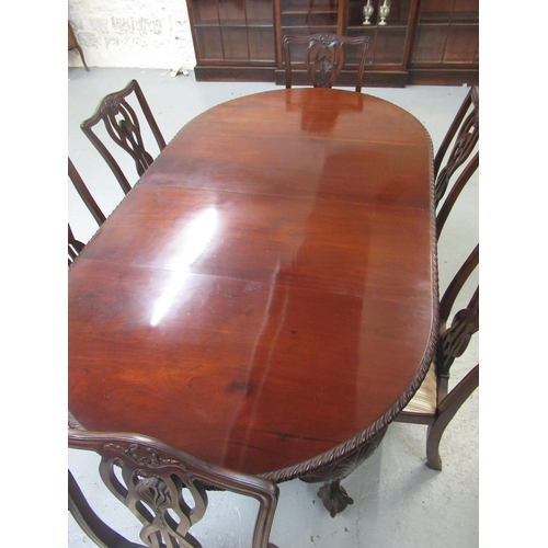 1885 - Chippendale style mahogany wind-out dining table with gadroon edge and two leaves, raised on carved ... 