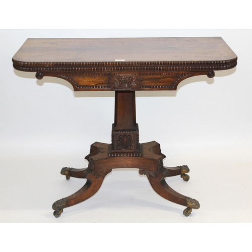 1896 - 19th Century rosewood card table, the hinged swivel top with baize lined interior and gadroon moulde... 