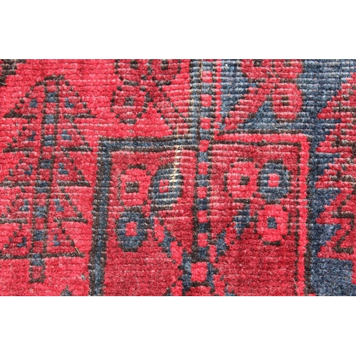 19 - Afghan rug of four central medallions and multiple borders, 226 x 115cm