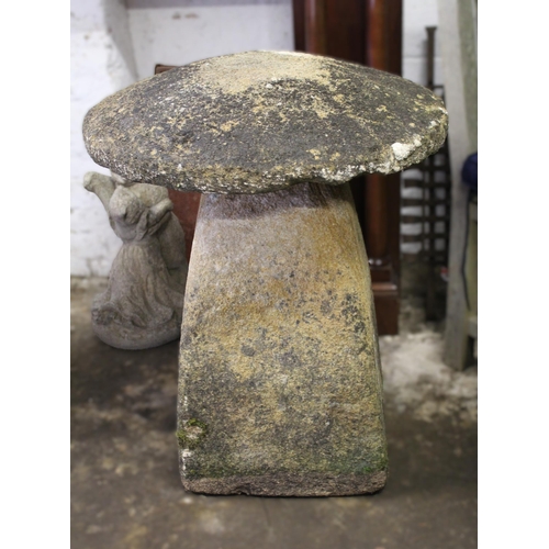 1906 - Pair of carved stone staddle stones with circular tops and square tapering bases