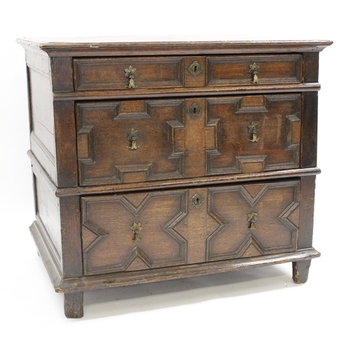 1912 - 17th Century oak chest with three drawers decorated with geometric mouldings