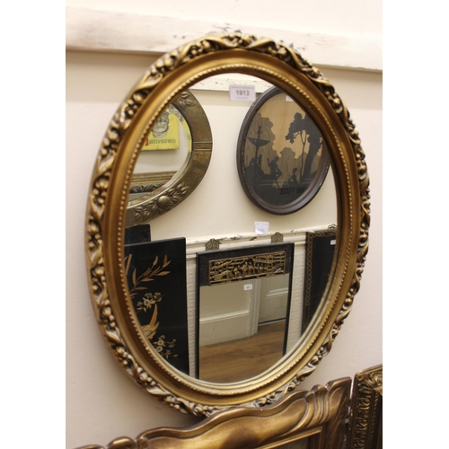 1913 - 20th Century decorative oval gilt framed wall mirror, 56 x 45cm