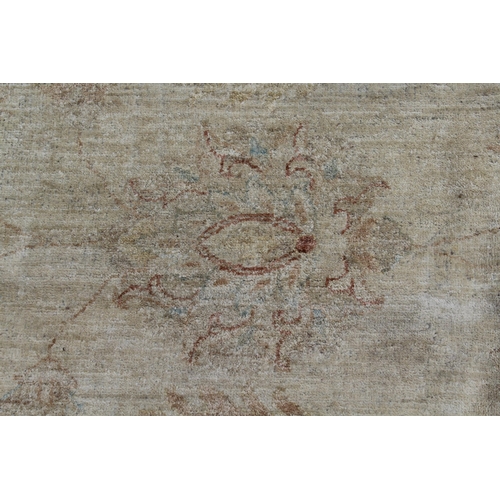 2 - Chobi carpet of floral design with multiple borders on beige ground, 370cm x 278cm